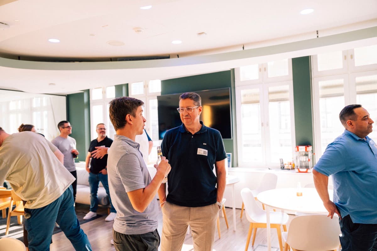 Members in conversation at a live event